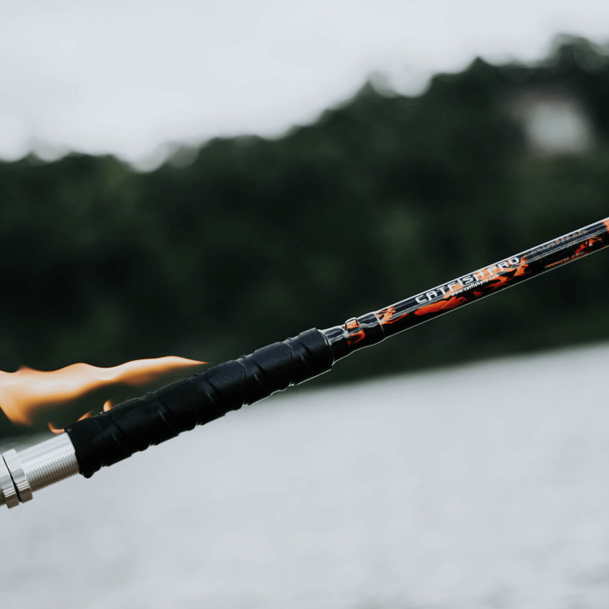 Black Dragon Fire Glow-in-the-Dark Spinning Rod