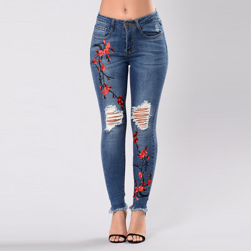 Women’s embroidered distressed denim jeans